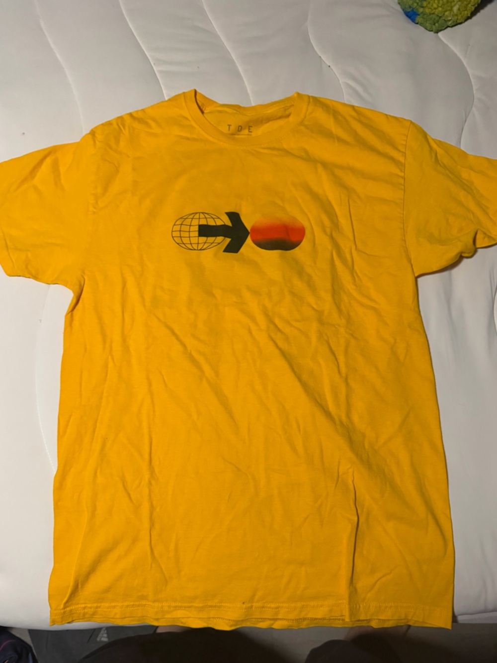 tde. Yellow Graphic Tee with Black Print